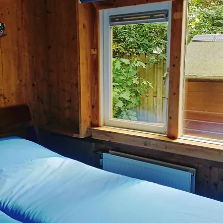 Het Houten Boshuisje